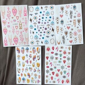 Brand New 5 Pack Nail Art Stickers - Evil Eye, Mushrooms etc.